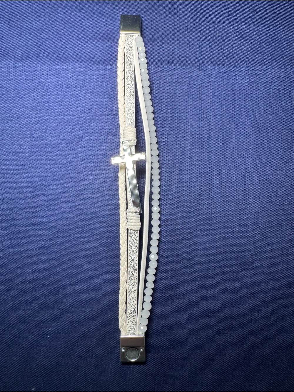 White Multi-Strand Cross Bracelet with Silver Accent